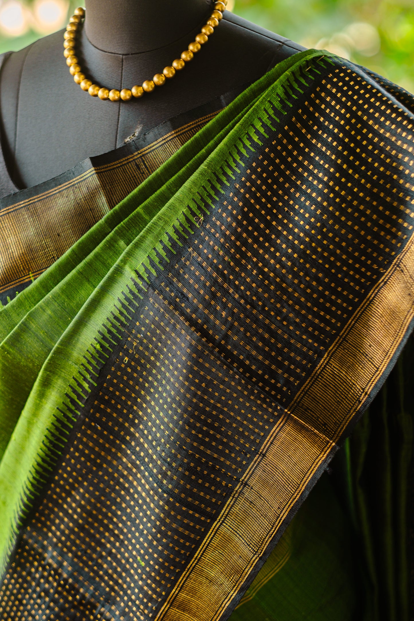 Classic Green Raw Silk Saree with Lustrous Finish