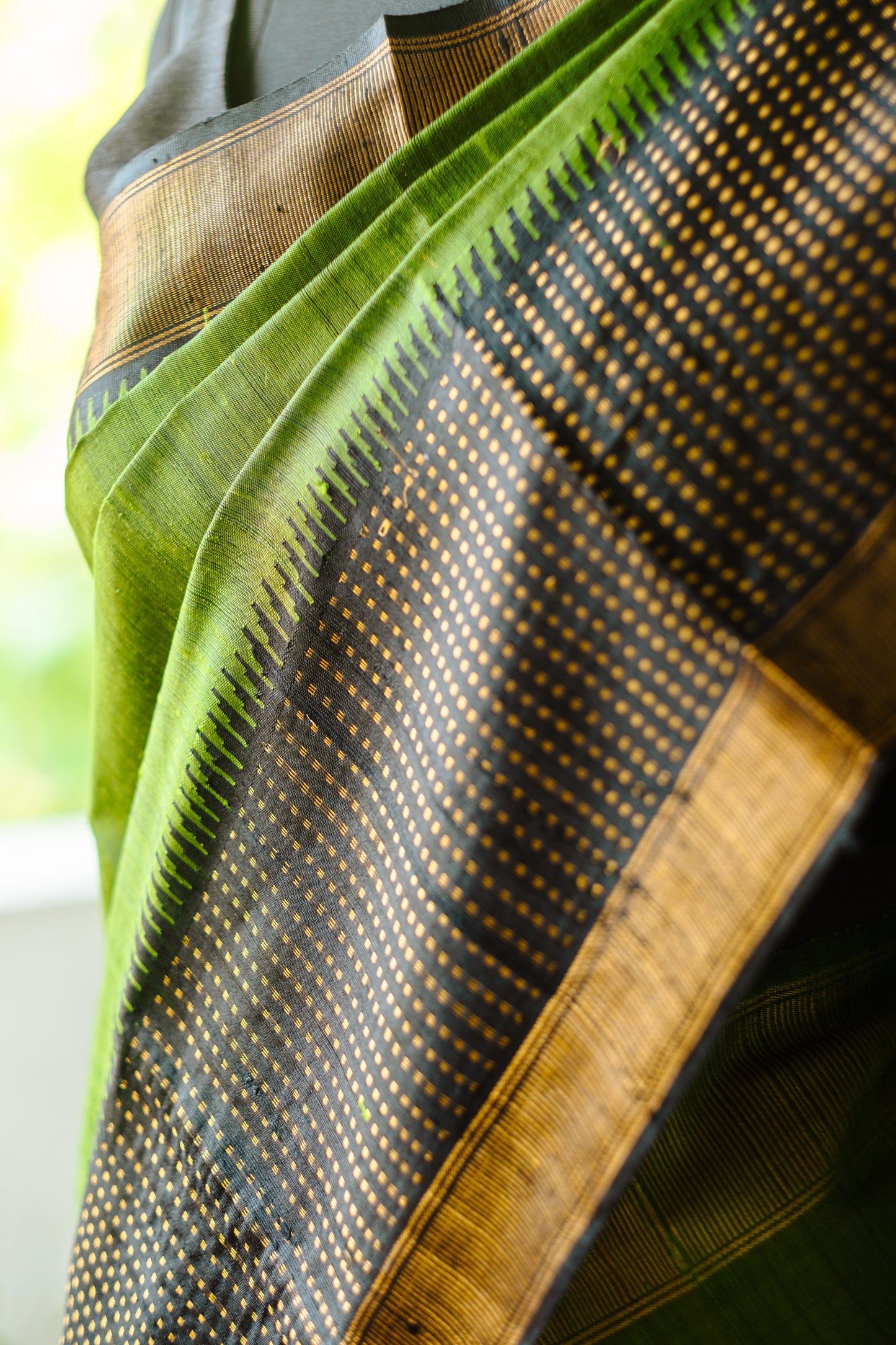Classic Green Raw Silk Saree with Lustrous Finish
