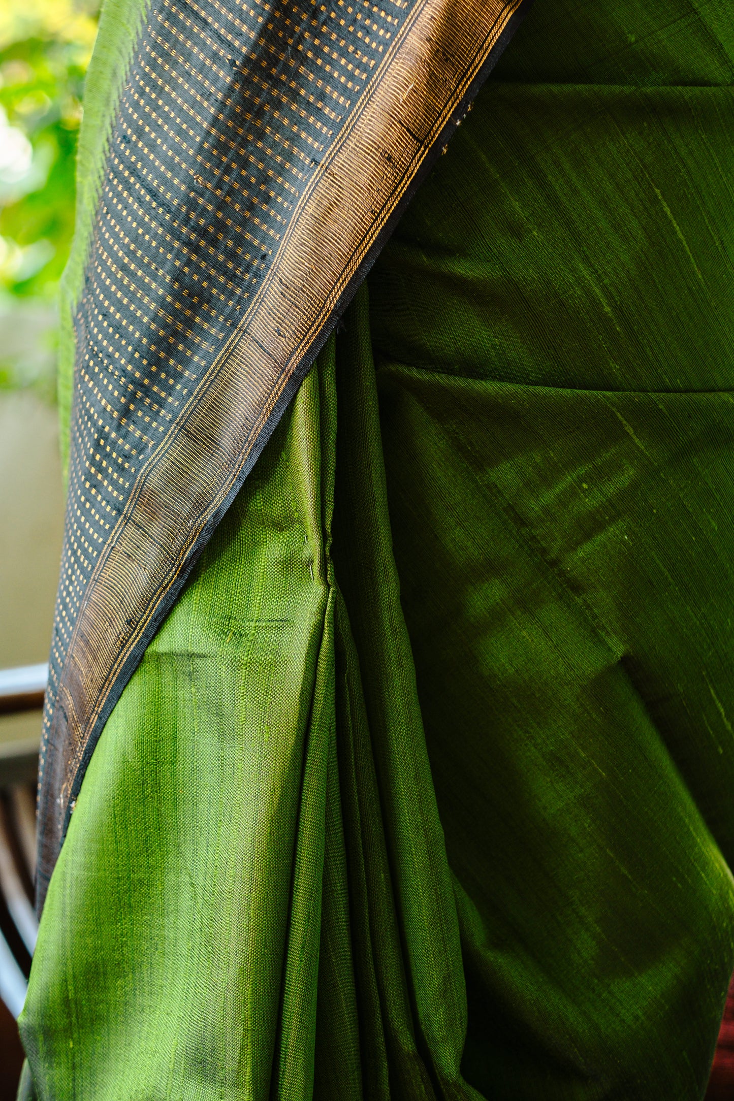 Classic Green Raw Silk Saree with Lustrous Finish
