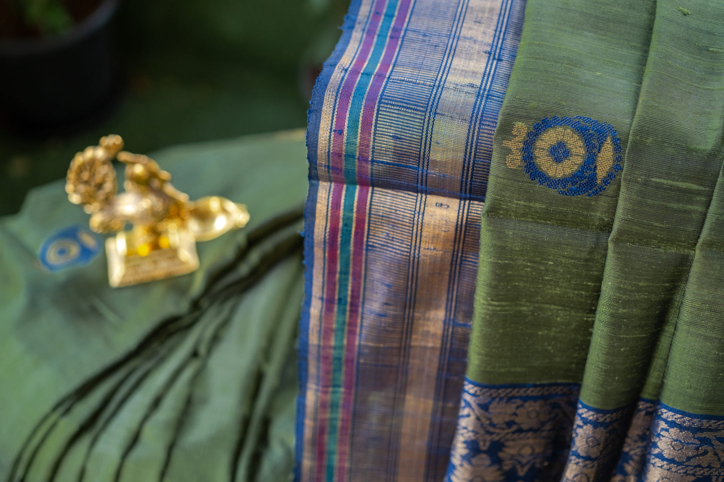 Classic Dark Green Raw Silk Saree with Lustrous Finish